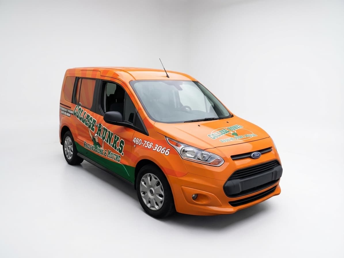 Orange and green vehicle wrap for College Hunks Hauling Junk on a Ford Transit van in a white studio.