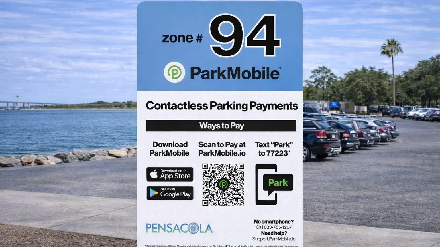 ParkMobile zone sign at a waterfront parking lot showing Zone 94, QR code, and payment instructions.