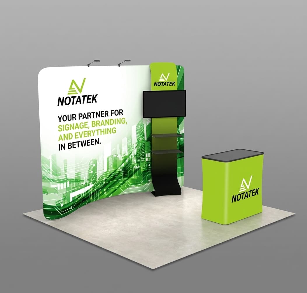 3D render of a NOTATEK branded trade show booth with curved back wall, monitor stand, and counter.