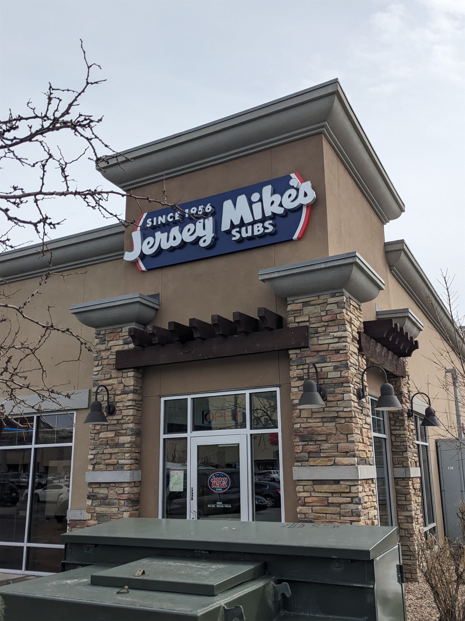 Jersey Mike's Subs illuminated exterior building sign mounted on storefront.