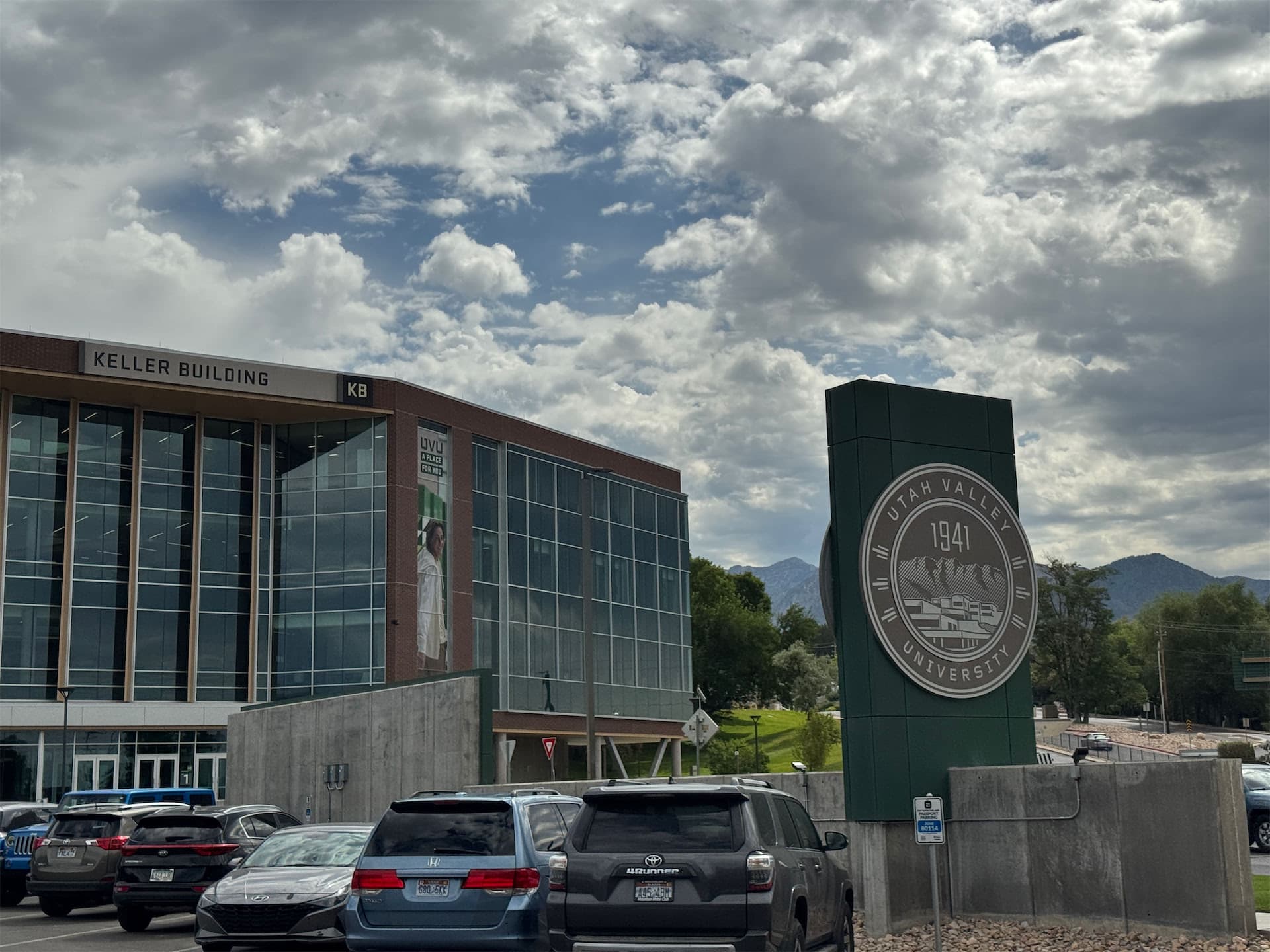 Utah Valley University monument seal sign standing in front of the Keller Building.